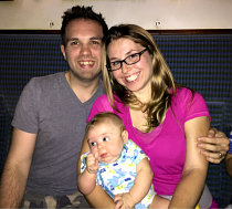 image of Rachel, husband, and infant