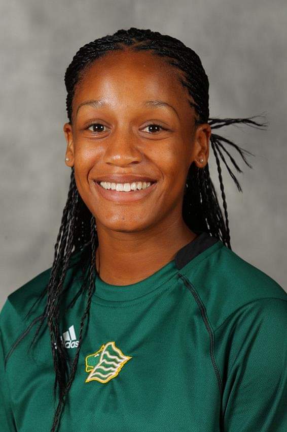 A head shot of Jasmine Johnson, a Saint Leo alumna, wearing a Saint Leo shirt