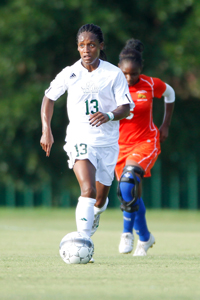 A photo of Jasmine Johnson playing soccer for the Saint Leo women's soccer team