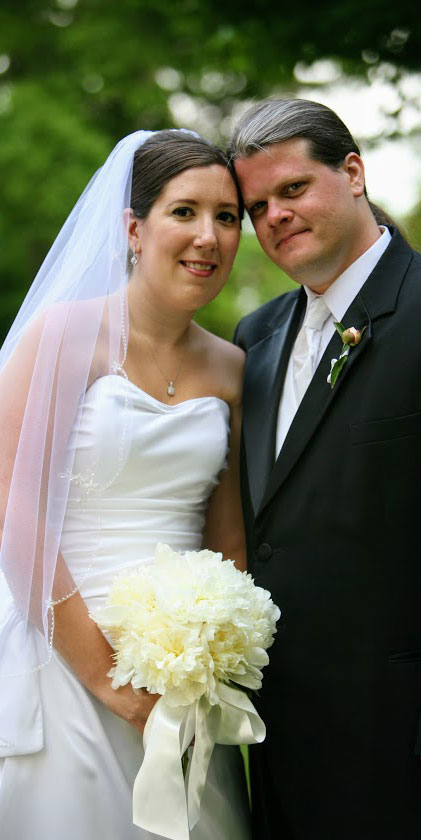 A photo of Drs. Lee Hobbs and Allyson Marino, two Saint Leo University English professors, at their wedding in 2007 when they were still working toward their doctoral degrees