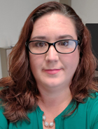 A Head shot of Sara Krieger, a master's in instructional design student at Saint Leo University and contractor for NATO