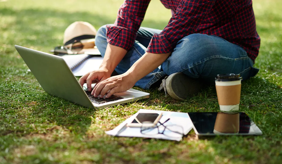 A student working in a park