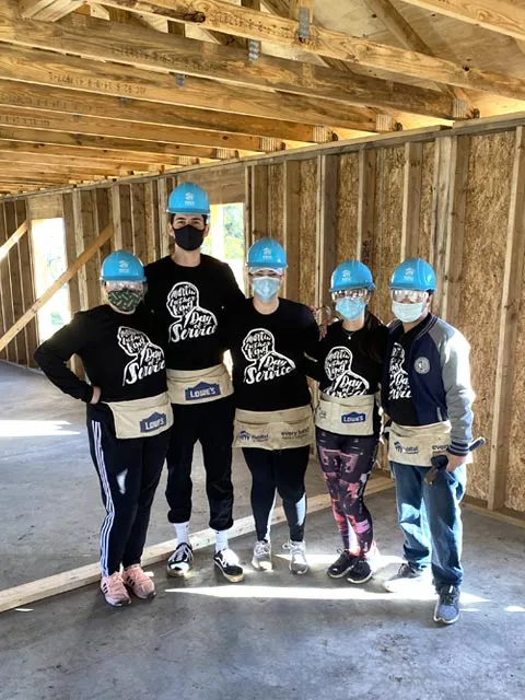 Saint Leo University students volunteering with Habitat for Humanity