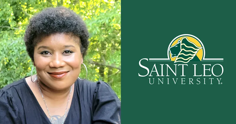 A head shot of Tisha Arther, a Saint Leo University triple alumna, wearing a necklace and smiling outside