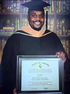 Saint Leo University Alumnus Colin Bryant with MBA diploma