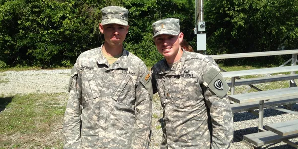 A photo of Chris and James “Dakota” Swonger, two alumni of Saint Leo University and the Saint Leo ROTC program, standing at their graduation from Army Ranger School in 2015