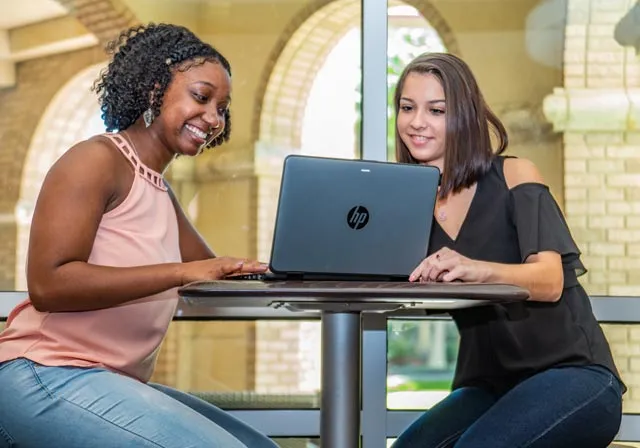 Student success coach working with Saint Leo student