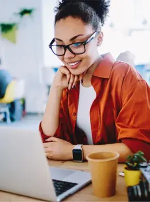 online university student working on laptop