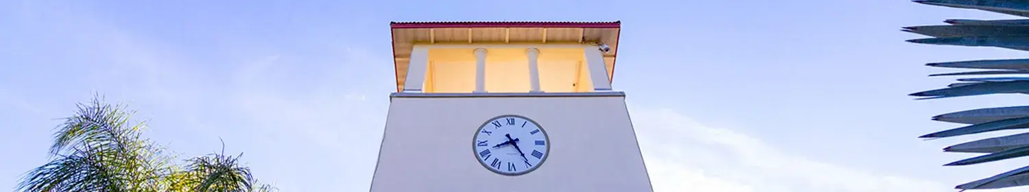 image of clocktower at dawn on Saint Leo University campus
