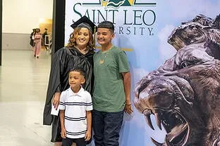 A Saint Leo grad celebrates with family
