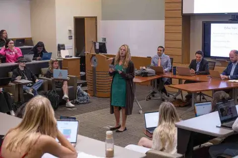 A photo of a debate between two teams of students in the Faith and Politics honors course at Saint Leo's University Campus in the spring of 2023