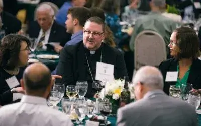 web-image-bishop-parkes-at-table