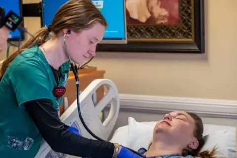 web-image-grace-lundfelt-checks-patient