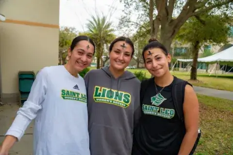 Kristina Arwady and two teammates