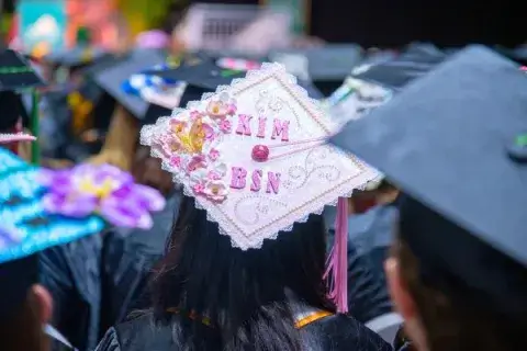 web-image-kim-cotal-mortarboard