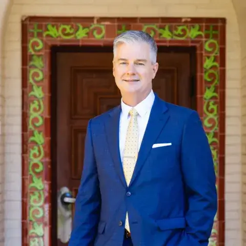 Dr. Burkee standing in front of Door