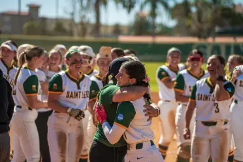 The No. 1-ranked Saint Leo softball team celebrates a win.