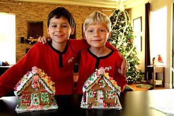Two kids with gingerbread houses
