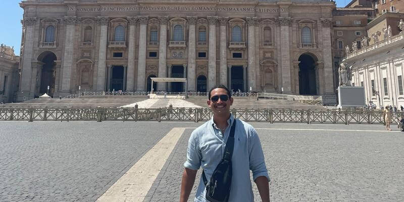 A photo of Rafael Soto, a current political science degree student at Saint Leo University, posing for a picture in Rome, Italy when he participated in the Catholic Worldview Fellowship trip to Europe in the summer of 2022; he and the other students also spent time in Germany