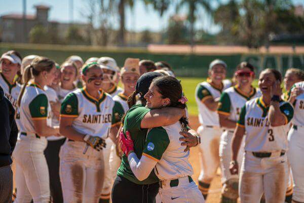 The No. 1-ranked Saint Leo softball team celebrates a win.